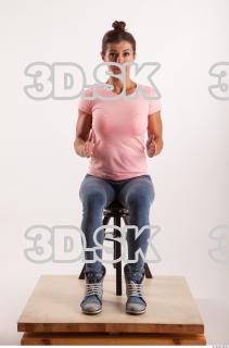 Sitting pose blue jeans pink t shirt of Oxana …